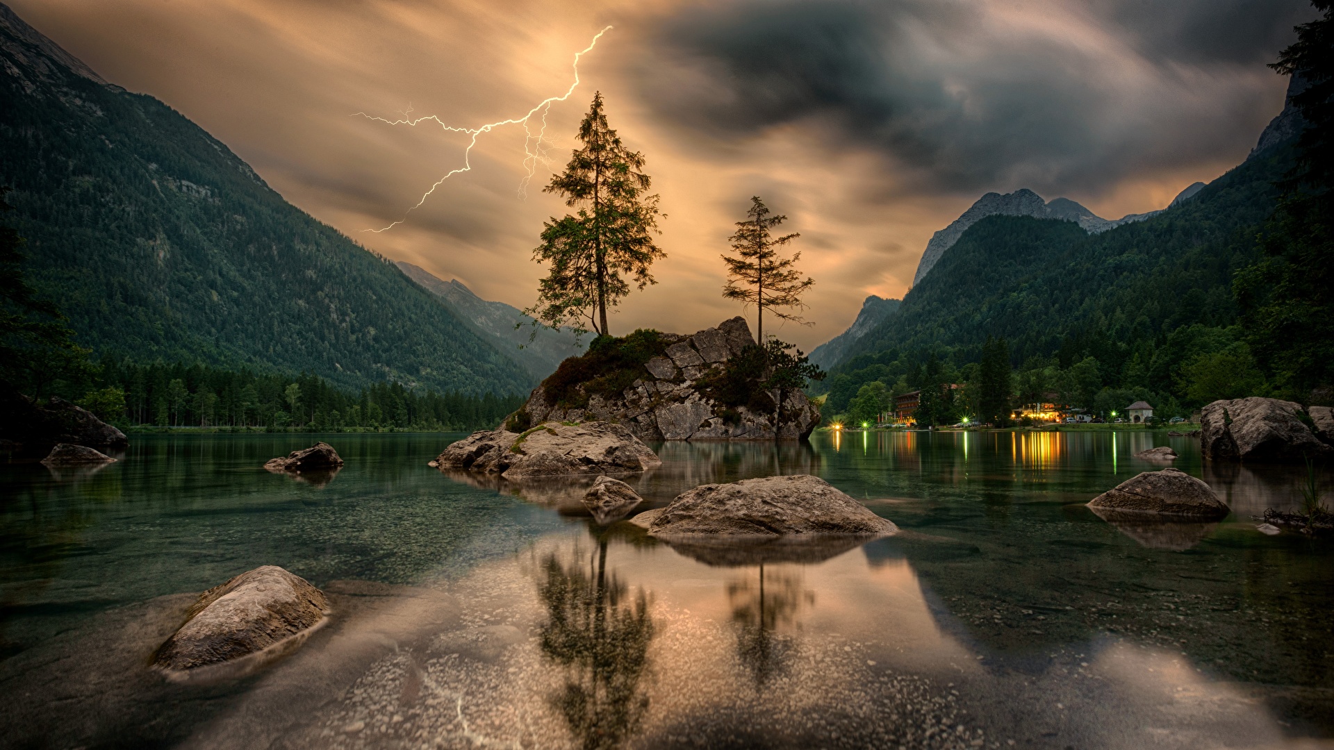 Mountains_Lake_Stones_Scenery_Trees_Lightning_555468_1920x1080